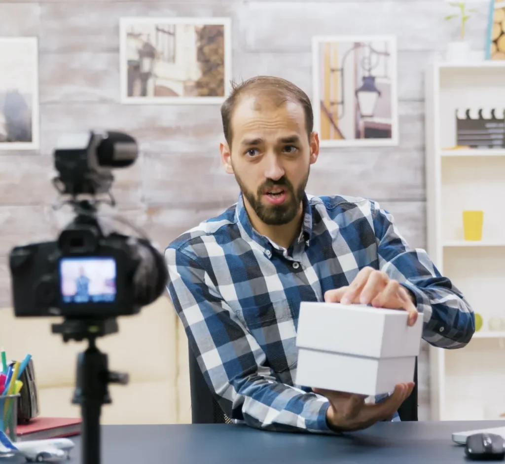 famous-young-influencer-recording-the-unboxing-of-a-phone